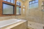 Gray Stone 2150: Ensuite Bathroom with Soaking Tub and Walk-in Shower
